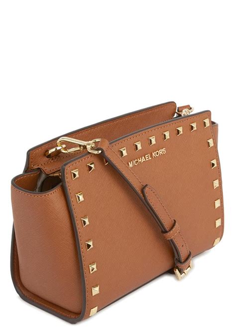 michael kors cosmetic bag tan|Michael Kors tan crossbody bag.